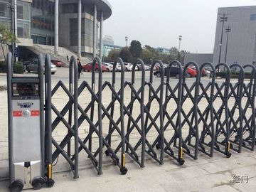 Porta retrátil elétrica da fábrica da segurança de aço inoxidável com controlo a distância sem fio